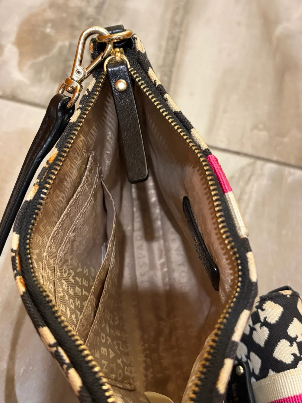 kate spade Black & Cream Patterned Wristlet with Pink Stripe